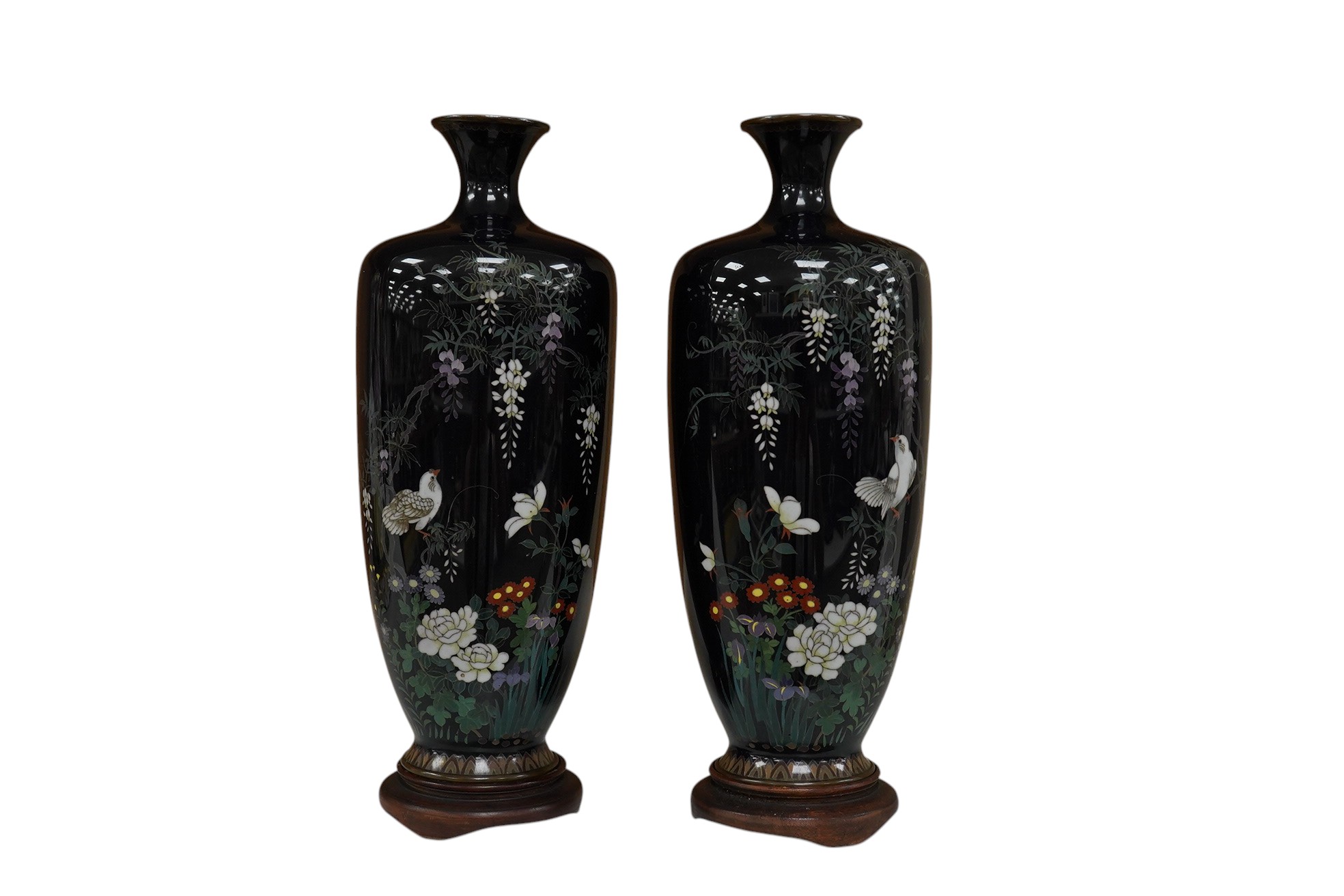 A pair of Japanese silver wire cloisonné enamel vases, Meiji period, wood stands, 18cm high